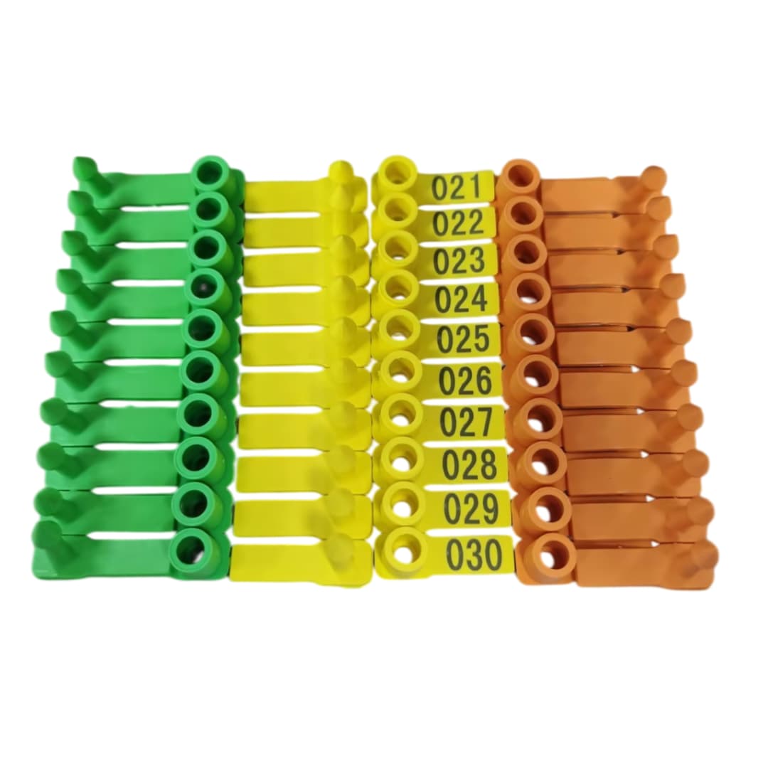 Multi-colornumberedlivestockeartagsyellowgreenorangewithsequentialnumbers
