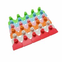 Bulkstripsofmulti-colorTPUeartagsinconnectedrows,farmlivestockidentificationtags